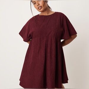 ASOS DESIGN Curve corduroy t-shirt mini dress with stitching detail in plum 14